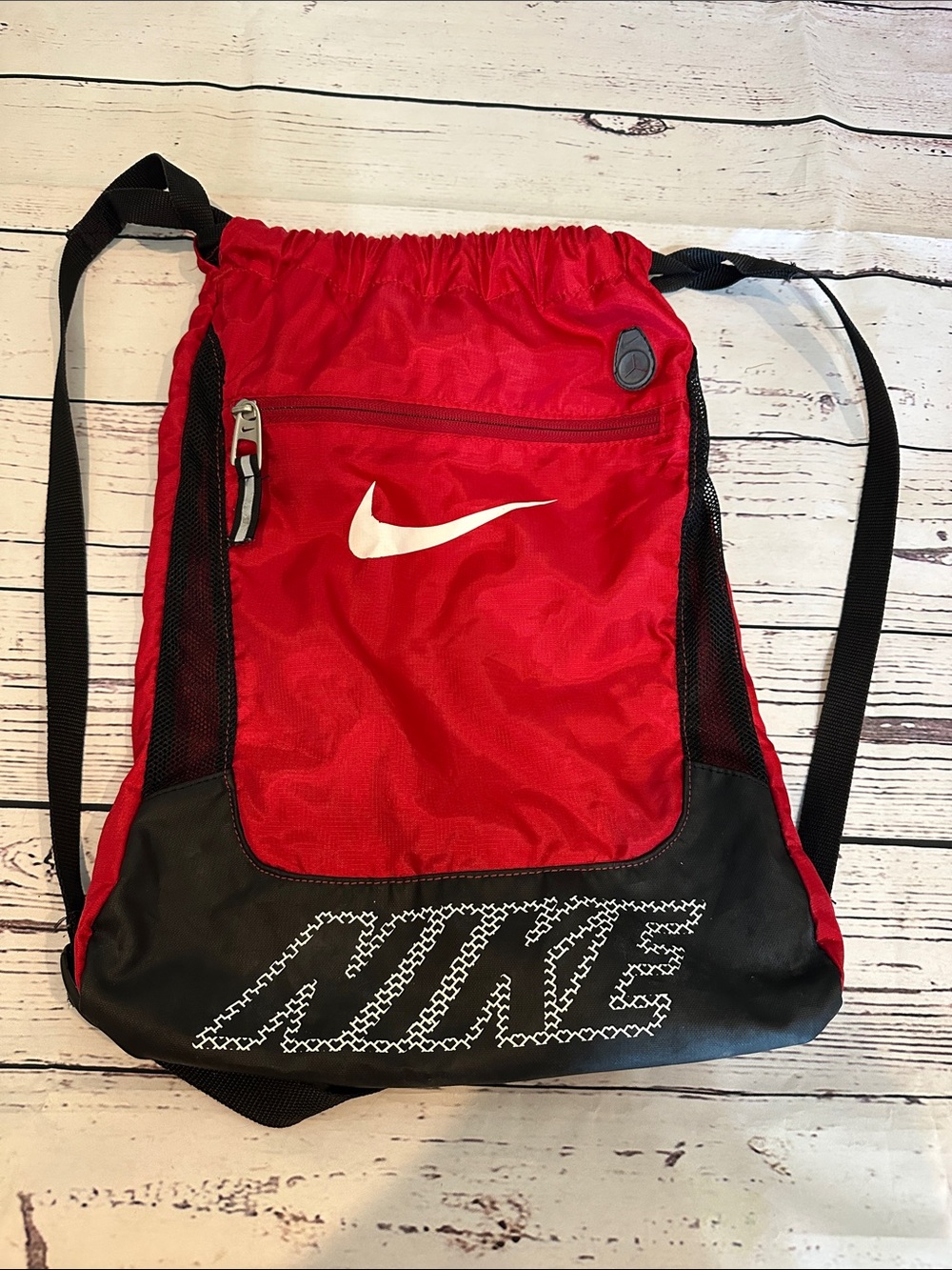 Nike Red and Black Drawstring Backpack with White Swoosh